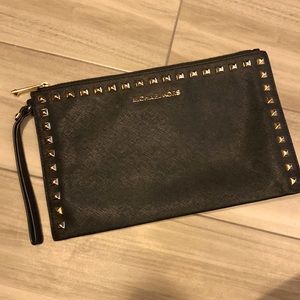 Black gold studded Michael Kors wristlet clutch